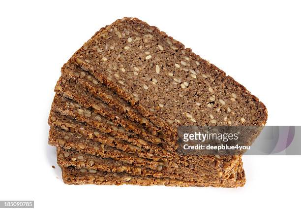 slices of rye bread on white background - rye bread stock pictures, royalty-free photos & images