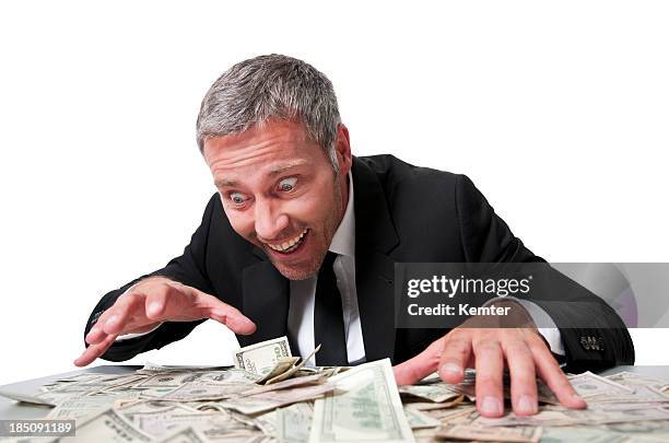 sonriente hombre de negocios con dollar bills - greed fotografías e imágenes de stock