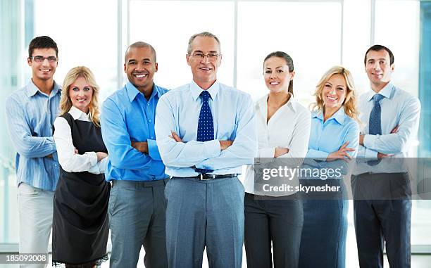 group of a businesspeople standing together. - hr suit stockfoto's en -beelden