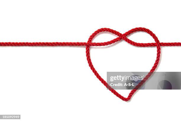 heart shaped rope - rode draad stockfoto's en -beelden