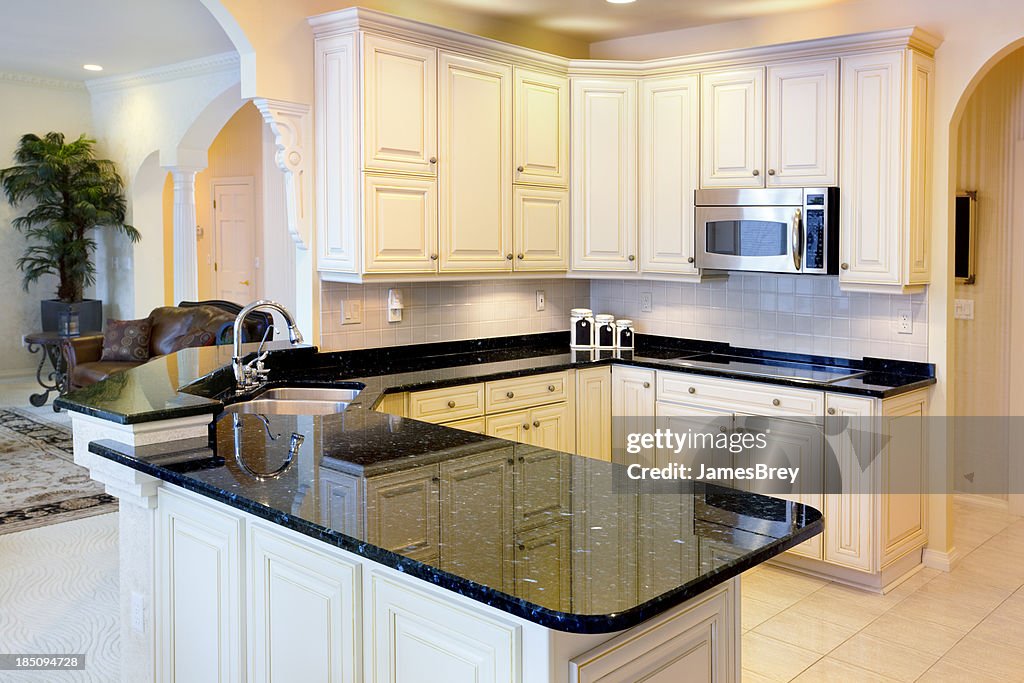 Bright White Kitchen With Granite Counters