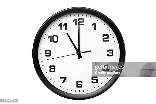 classic clock on wall - eleventh stock pictures, royalty-free photos & images