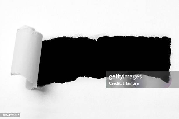 torn paper hole - paper rip stock pictures, royalty-free photos & images