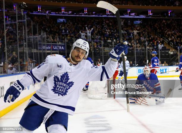 Auston Matthews of the Toronto Maple Leafs scores at 3:52 of the first period against Igor Shesterkin of the New York Rangers at Madison Square...