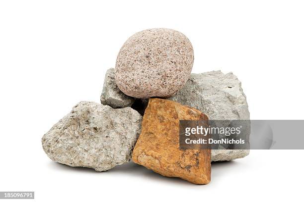 isolated rocks - kalksteen stockfoto's en -beelden