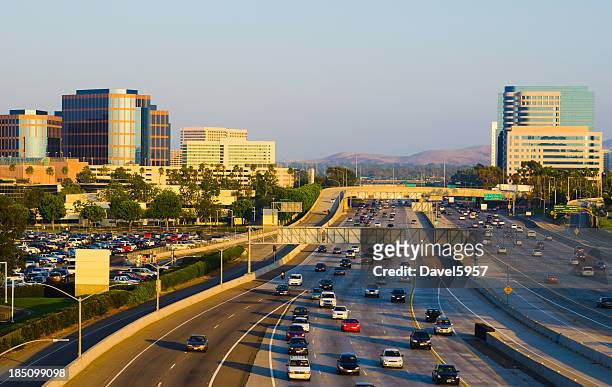 irvine skyline and freeway - orange county kalifornien bildbanksfoton och bilder