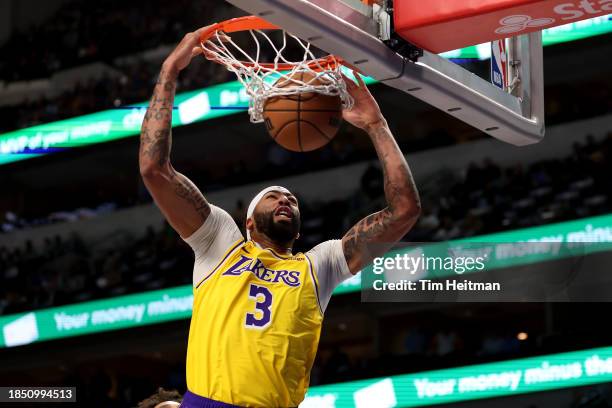 Anthony Davis of the Los Angeles Lakers dunks the ball against the Dallas Mavericks in the first half at American Airlines Center on December 12,...