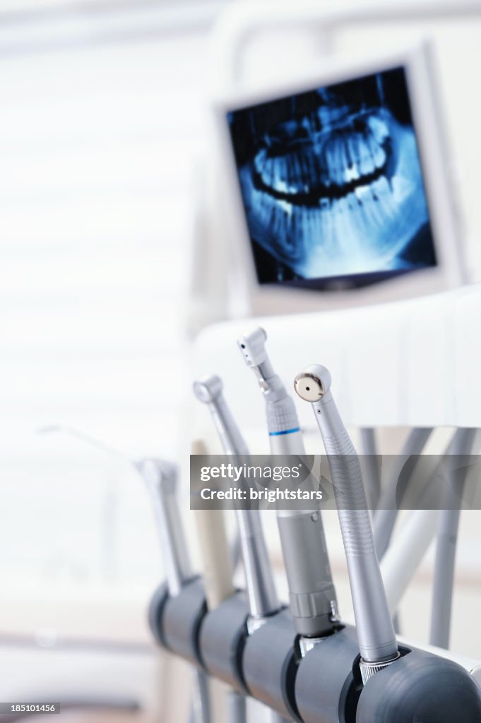 Dental tools against computer monitor