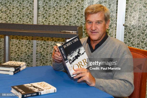 Former Boston Bruins hockey player Bobby Orr signs copies of his autobiography "Orr: My Story" at Barnes & Noble Prudential Center on October 17,...
