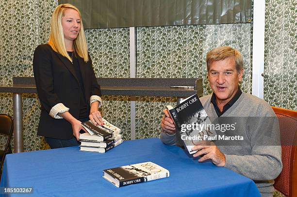 Former Boston Bruins hockey player Bobby Orr signs copies of his autobiography "Orr: My Story" at Barnes & Noble Prudential Center on October 17,...