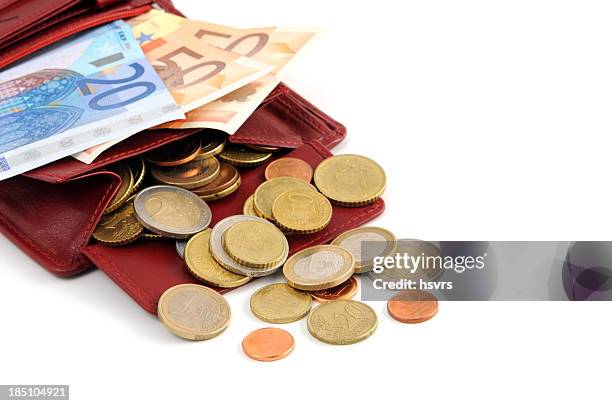 euro coin and paper currency falling out of wallet - 2 cents stockfoto's en -beelden