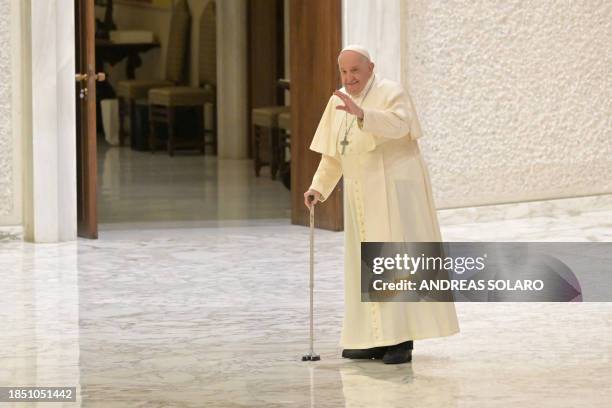 Pope Francis leaves after an audience to the participants of the live nativity scene of Santa Maria Maggiore, on December 16, 2023 at Paul-VI hall in...