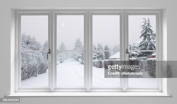 winter morning through white windows - raam stockfoto's en -beelden