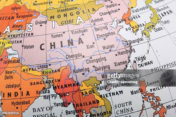 image of a globe focusing on southeast asia - rusland kaart stockfoto's en -beelden