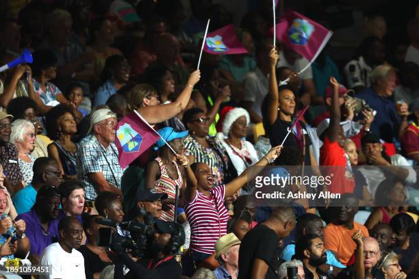 West Indies fans cheer during the 1st T20 International between West Indies and England at Kensington Oval on December 12, 2023 in Bridgetown,...
