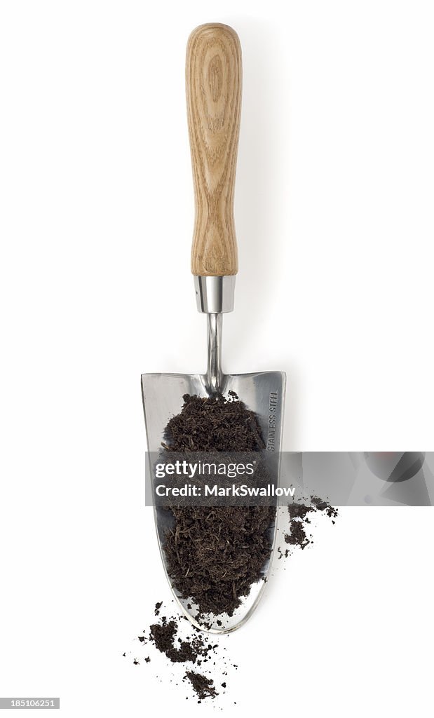 Kompost auf einer Kelle-Handwerk und Garten