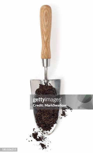 compost on a trowel - dirt stock pictures, royalty-free photos & images