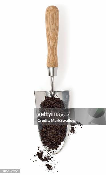 compost on a trowel - shovel 個照片及圖片檔