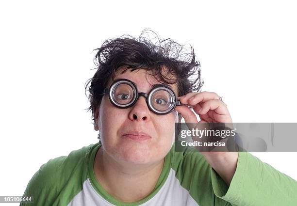 nerd woman looking through thick glasses - ugly woman stockfoto's en -beelden