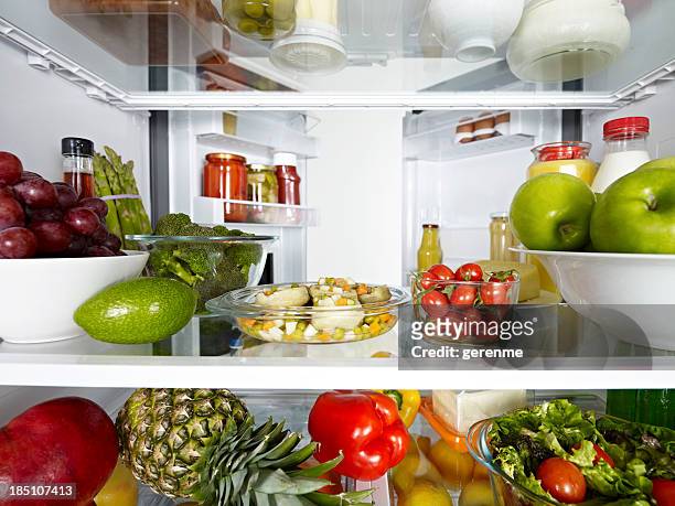 full fridge - refrigerator stock pictures, royalty-free photos & images