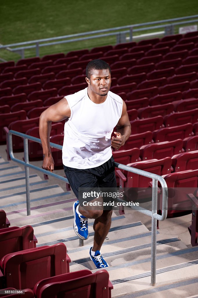 Athlete Running up Statium Stairs