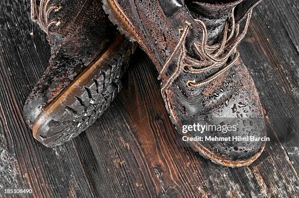 wet hiking boot - old boots stock pictures, royalty-free photos & images