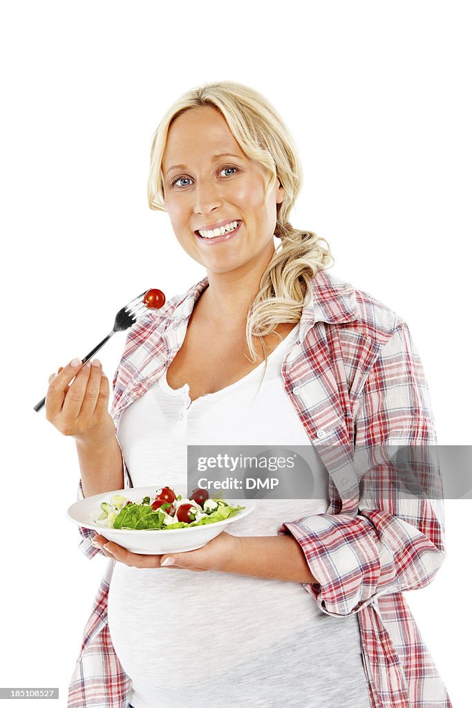 Pregnant woman eating healthy food