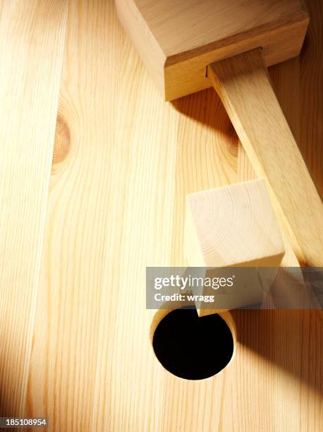 looking over a round hole and square peg - square peg stock pictures, royalty-free photos & images