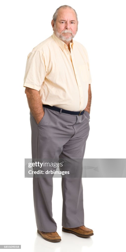 Senior Man Standing With Hands In Pockets