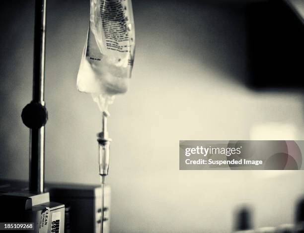 iv drip - iv drip stock pictures, royalty-free photos & images