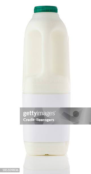 two pint bottle of semi-skimmed milk on a white background - mjölkflaska bildbanksfoton och bilder