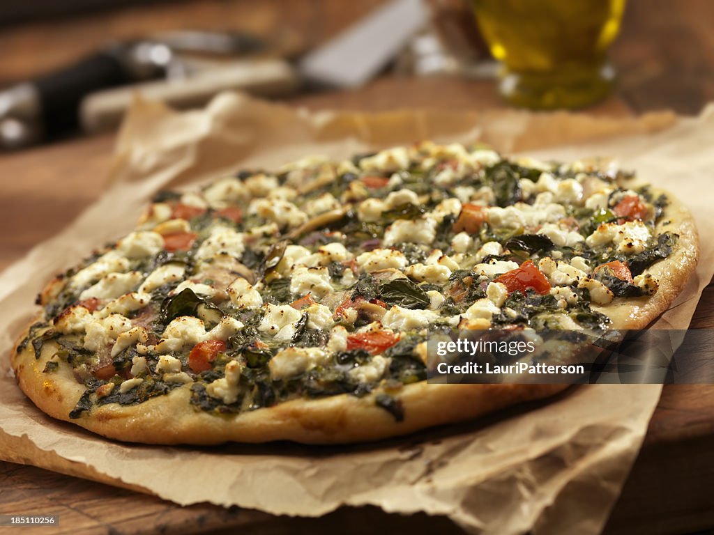 Pizza aux épinards et fromage de chèvre