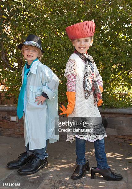 dress up brother and sister - kid in big shoes stock pictures, royalty-free photos & images