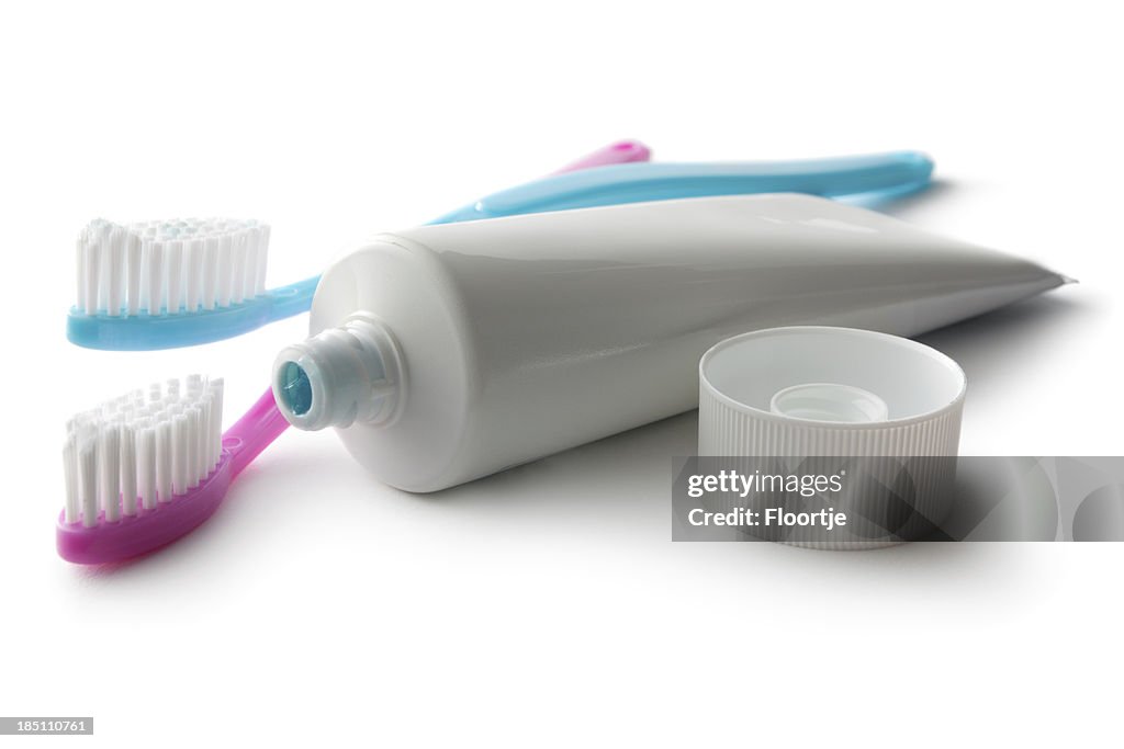 Bath: Toothbrushes and Toothpaste Isolated on White Background