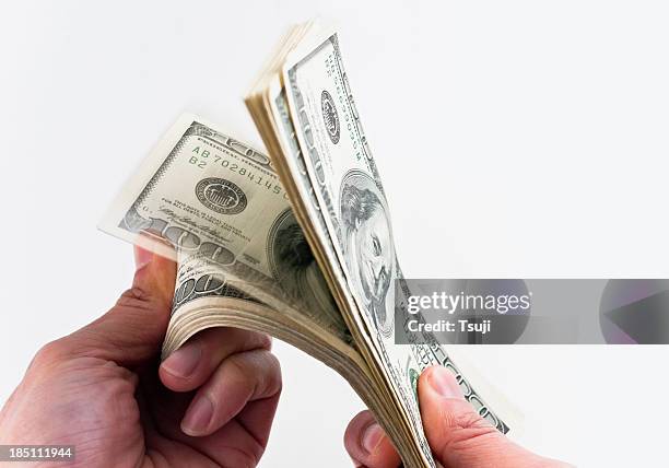 counting money - throwing money stock pictures, royalty-free photos & images