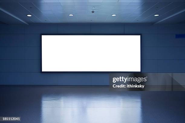 blank billboard - airport indoor stockfoto's en -beelden