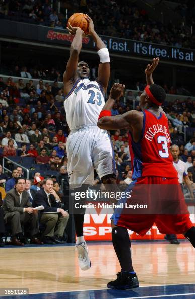 Michael Jordan of the Washington Wizards shoots against Quentin... News ...
