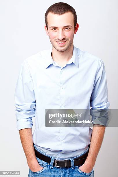 casual homem jovem - polo shirt imagens e fotografias de stock