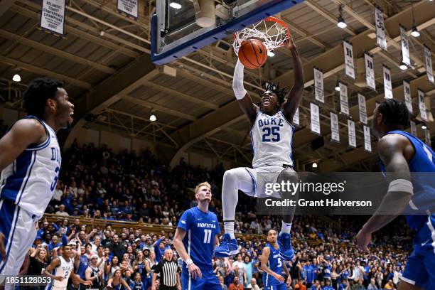 Mark Mitchell of the Duke Blue Devils dunks against the Hofstra Pride during the second half of the game at Cameron Indoor Stadium on December 12,...