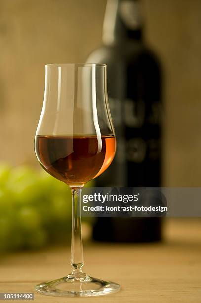 glass of sherry or madeira wine - madeira wine stock pictures, royalty-free photos & images