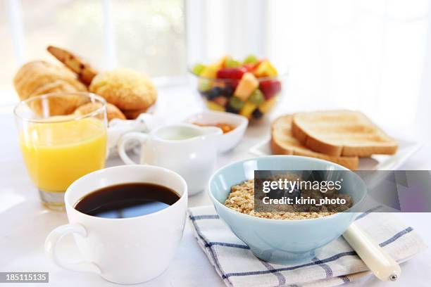 close-up of variety of breakfast selections - coffee on table stock pictures, royalty-free photos & images