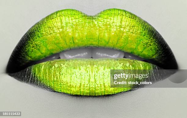 woman green lips - green lip stock pictures, royalty-free photos & images