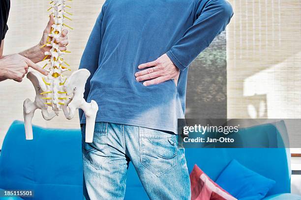 lumbar pain - hip stock pictures, royalty-free photos & images