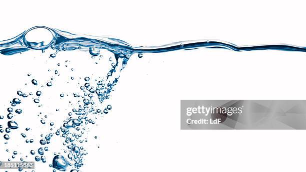 water splash with bubbles - surface level stock pictures, royalty-free photos & images