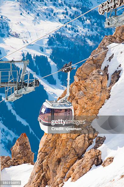 cabin lift in france - meribel stock pictures, royalty-free photos & images