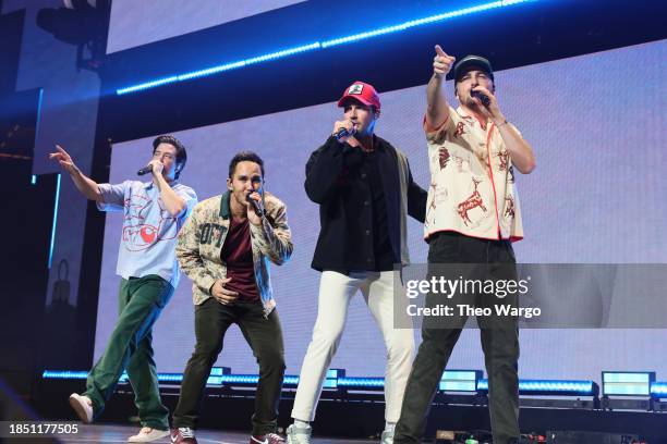 Logan Henderson, Carlos PenaVega, James Maslow, and Kendall Schmidt of Big Time Rush perform onstage during iHeartRadio Q102's Jingle Ball 2023 at...