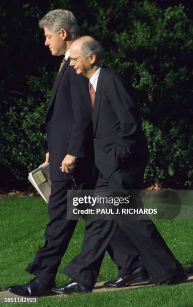 President Bill Clinton and US Secretary of Education Richard Riley leave the Oval Office of the White House prior to addressing the 1998-99 Blue...