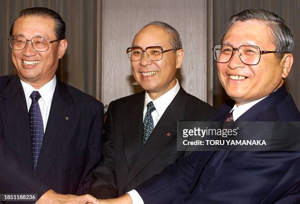 The presidents of three companies, L-R: Ken Matsuzawa of Nippon Fire and Marine Insurance Co. Ltd, Mutusharu Okamoto of Koa Fire and Marine Insurance...
