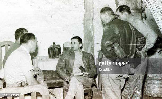 This 1954 file photo shows Guatemalan Col. Castillo Armas surrounded by supporters days before Armas led a coup that deposed President Jacobo Arbenz....