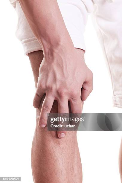 knee pain - male knee stock pictures, royalty-free photos & images